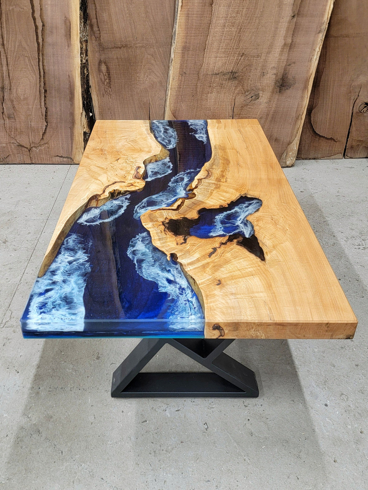 custom wooden table made with maple wood with ocean-inspired resin design (Dark blue waves, light blue shore, crashing white waves)