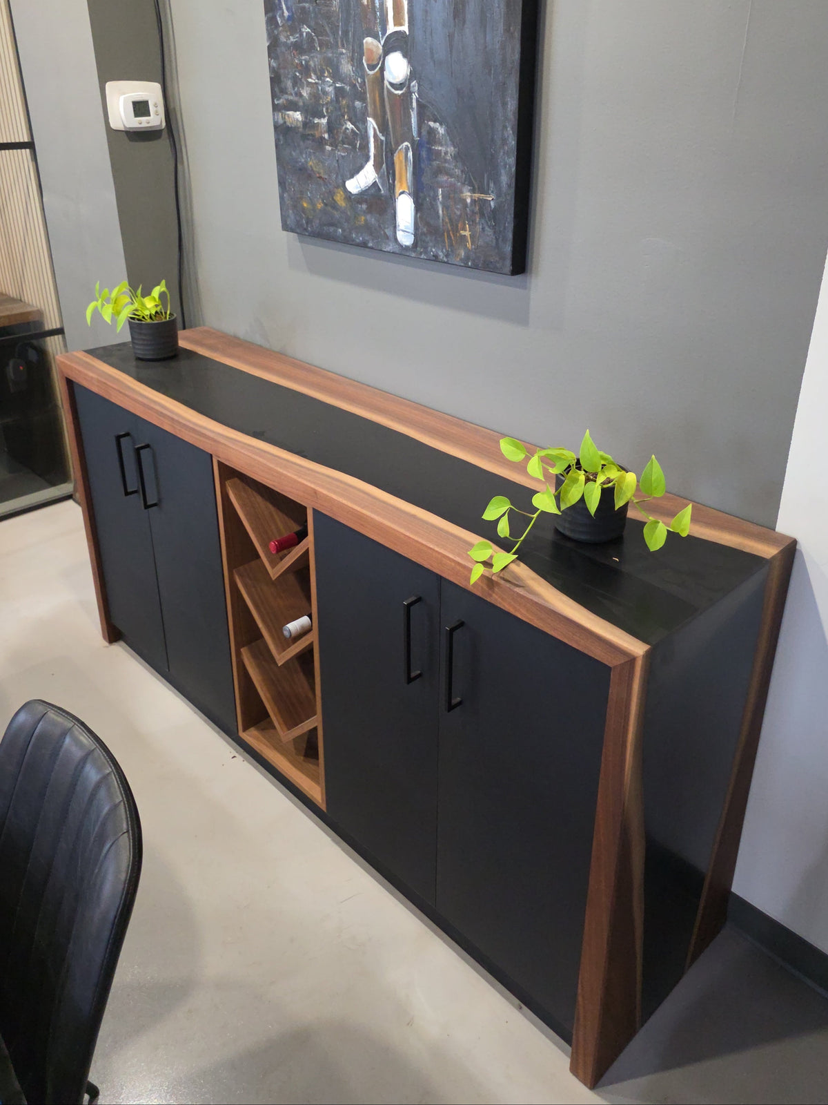 Walnut and black epoxy waterfall-style buffet