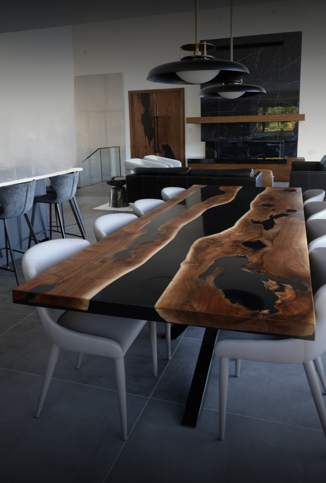 Modern dining room with a custom wooden walnut and epoxy dining table, with matching matchbook walnut and epoxy doors, walnut fireplace mantle piece made by Backyard Resin.